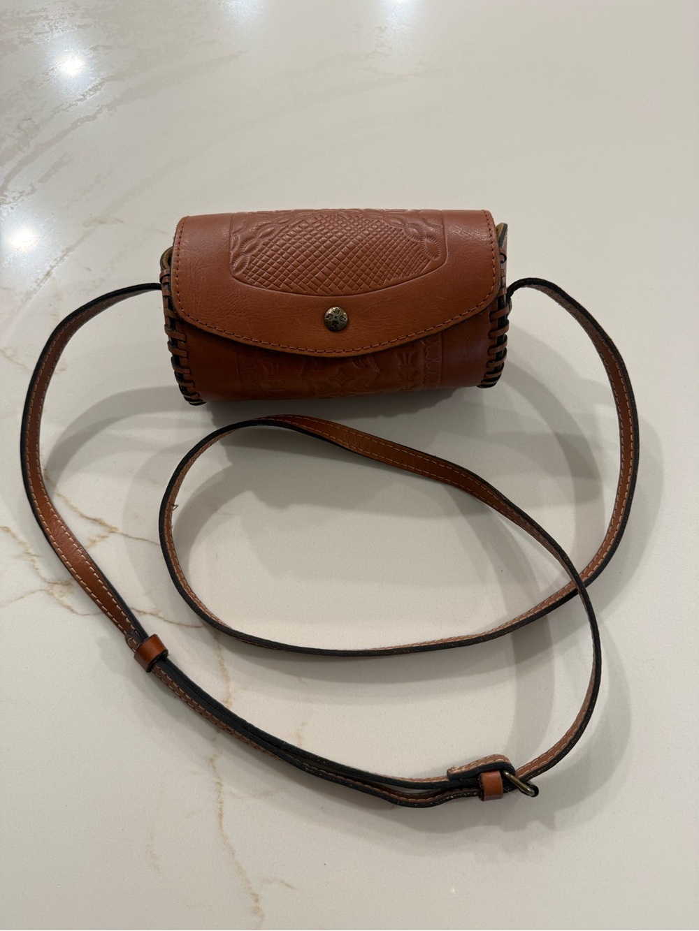 Patricia Nash - boho barrel Brown Leather Crossbody Bag with Embossed Detail